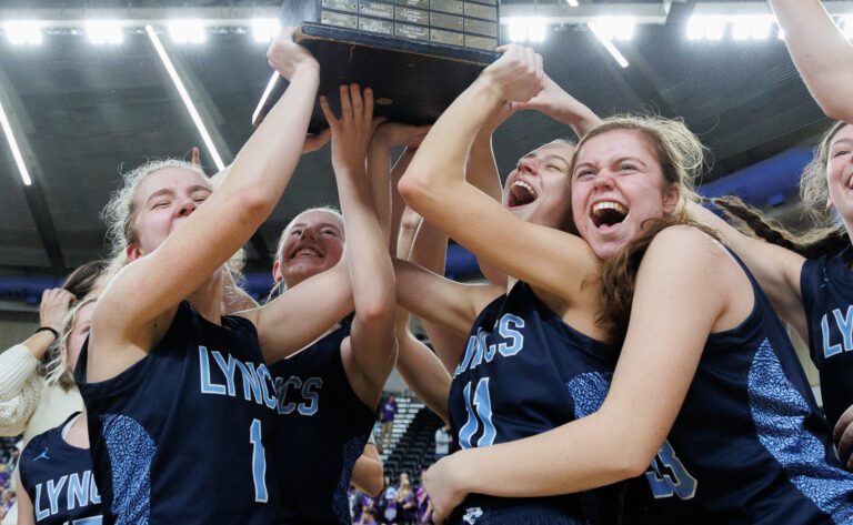 Lynden Christian team celebrates with their trophy.