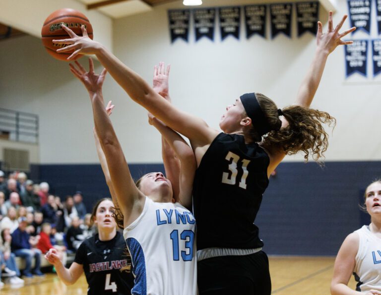 Eastlake’s Ava Schmidt gets a hand on the ball by Lynden Christian’s Grace Hintz.