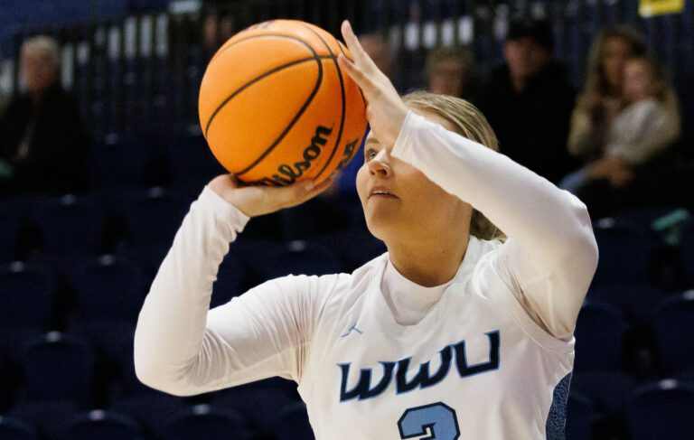 Western Washington University’s Riley Dykstra eyes the basket before shooting a 3-point shot.