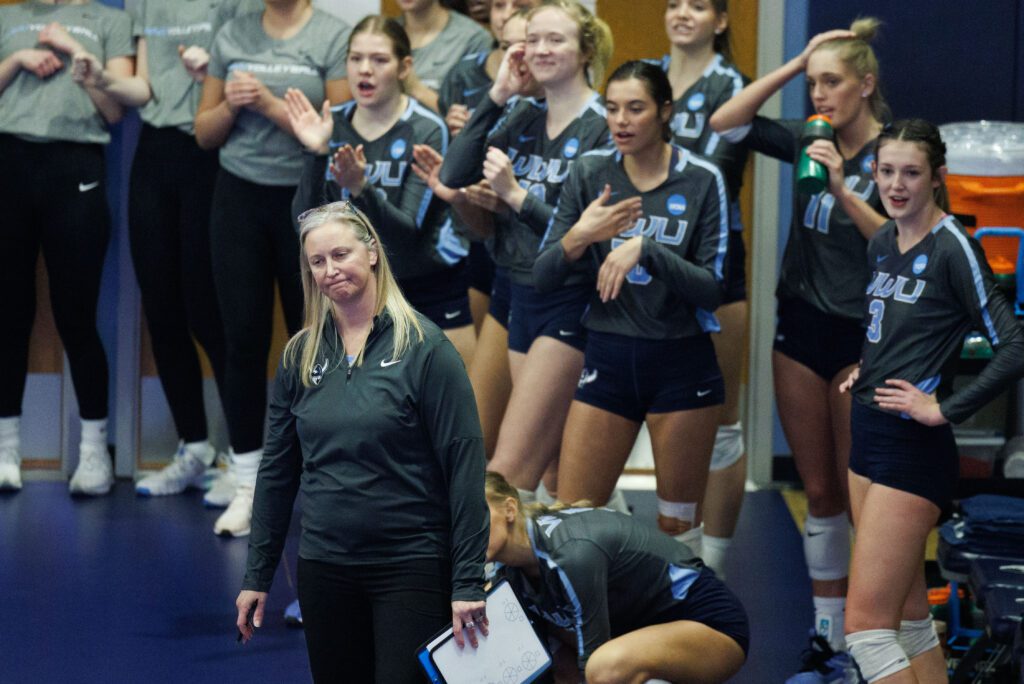 Western head coach Diane Flick-Williams reacts alongside her team.