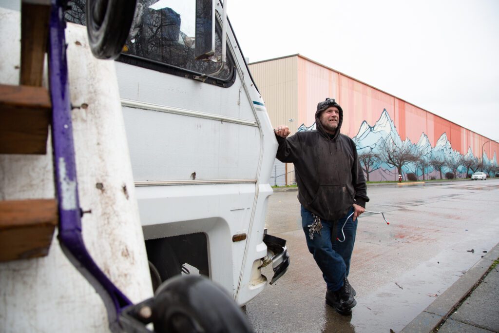 Ed Hunt leans against his RV on Cornwall Avenue.