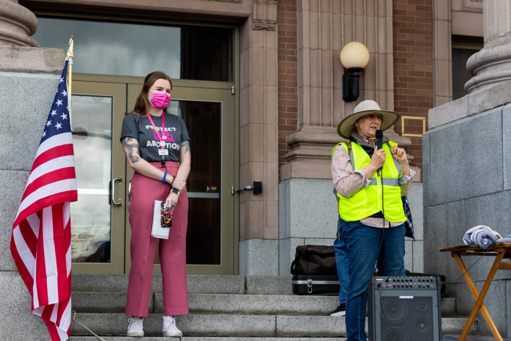 Elizabeth Pitts, left, of Mt. Baker Planned Parenthood stands next to Christine Kohnert of Indivisible Skagit.