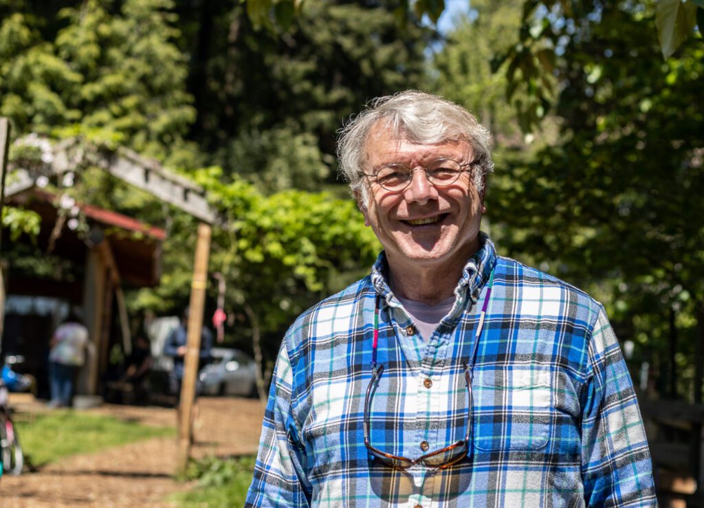 Jeff Hammarlund smiles underneath the bright sun.