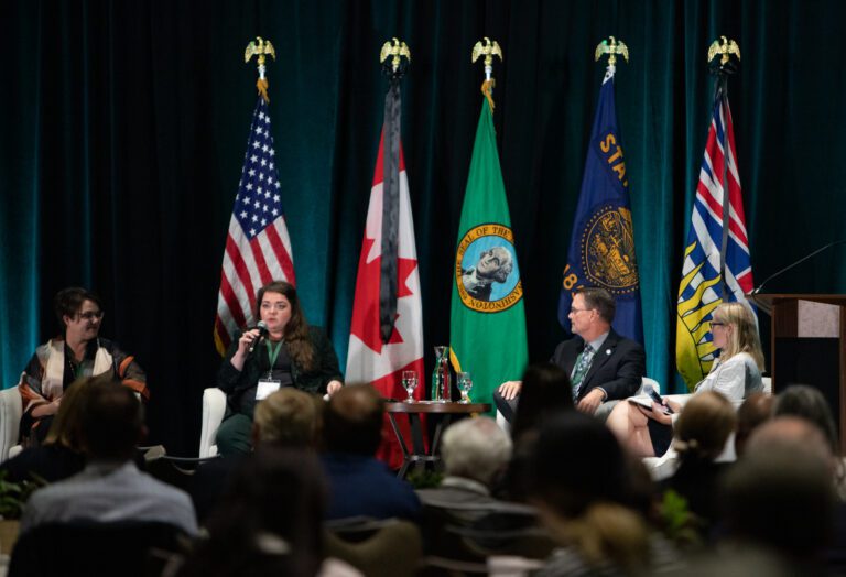 From left, Mount Vernon Mayor Jill Boudreau, Executive Director of Transportation Choices Alex Hudson and Mark Riker from the Washington State Building and Construction Trades Council talk on a panel about Ultra-High-Speed Ground Transportation.