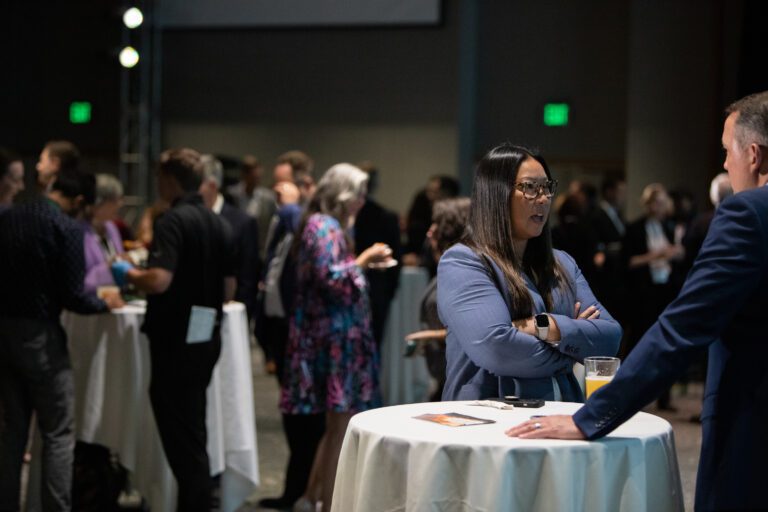 Attendees chat during a networking reception at the Cascadia 2050 Vision.