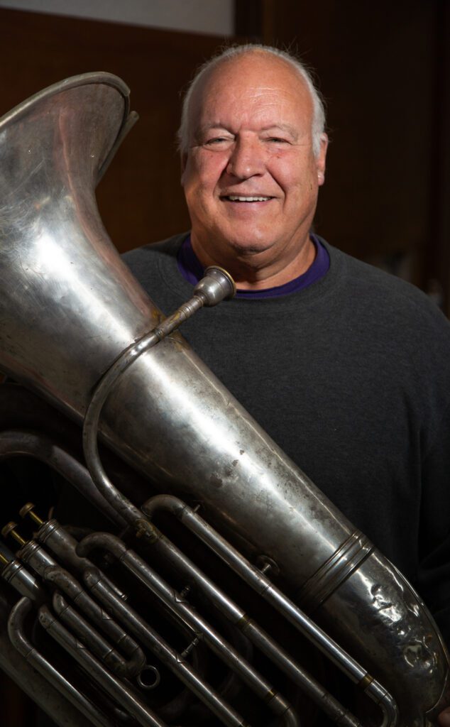 Steve Koch holds up his tuba.