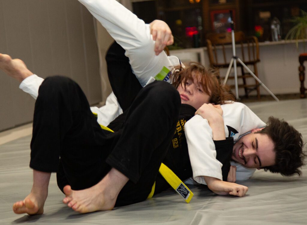 Marcel Senger and another Bellingham BJJ member practice on the mat.