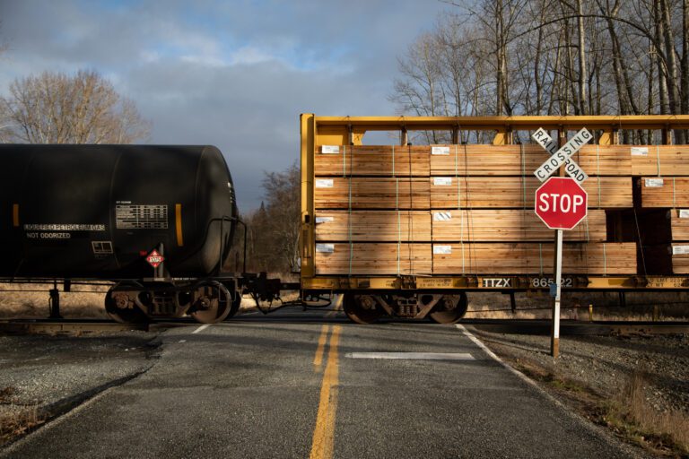 A train passes by a railroad stop section.