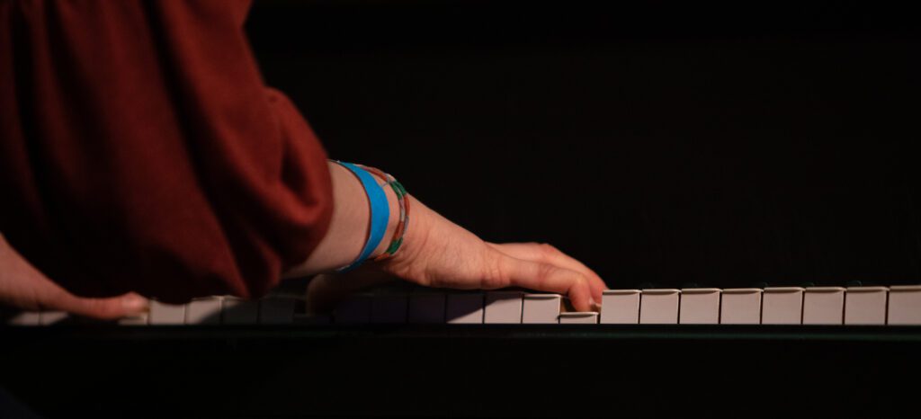 Western student McKenzie Bandy plays the piano.