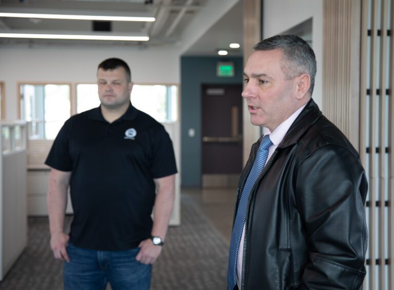 Facilities Project Manager Chris Jacox, left, and Director of Public Works Eric Johnston give a tour of the new building's interior.