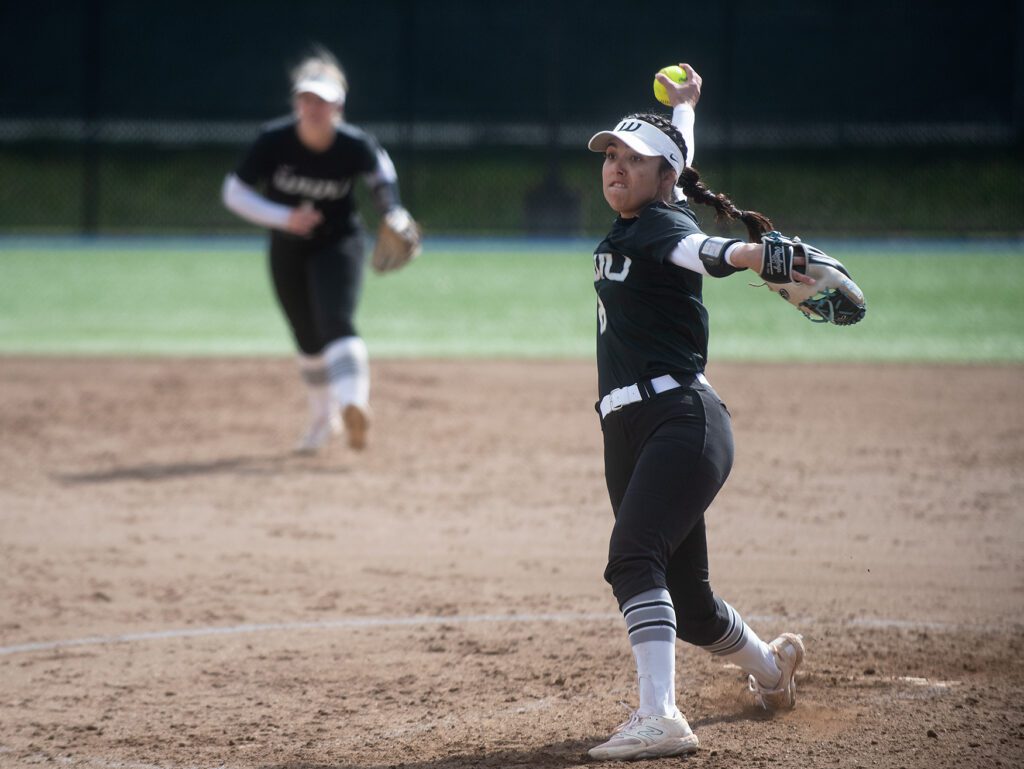 Western junior pitcher Mareena Ramirez makes an expression before pitching the ball.