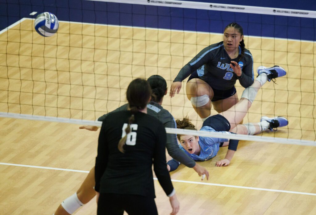 In spite of making the dig, Western Washington University's Kasey Woodruff and Tupu Lologo watch as the ball take a different direction.