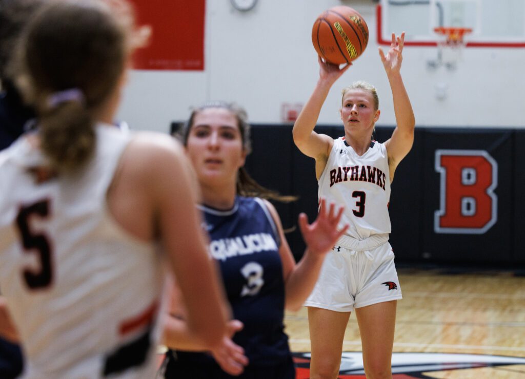 Bellingham's Ellie Wolverton puts up a shot behind a defender.