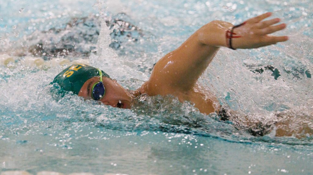 Sehome's Jaeli Tilley breaches for air while swimming freestyle.