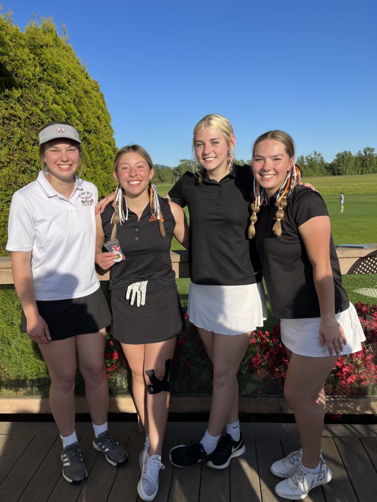 Blaine girls golf team poses for a group photo at the golf course.