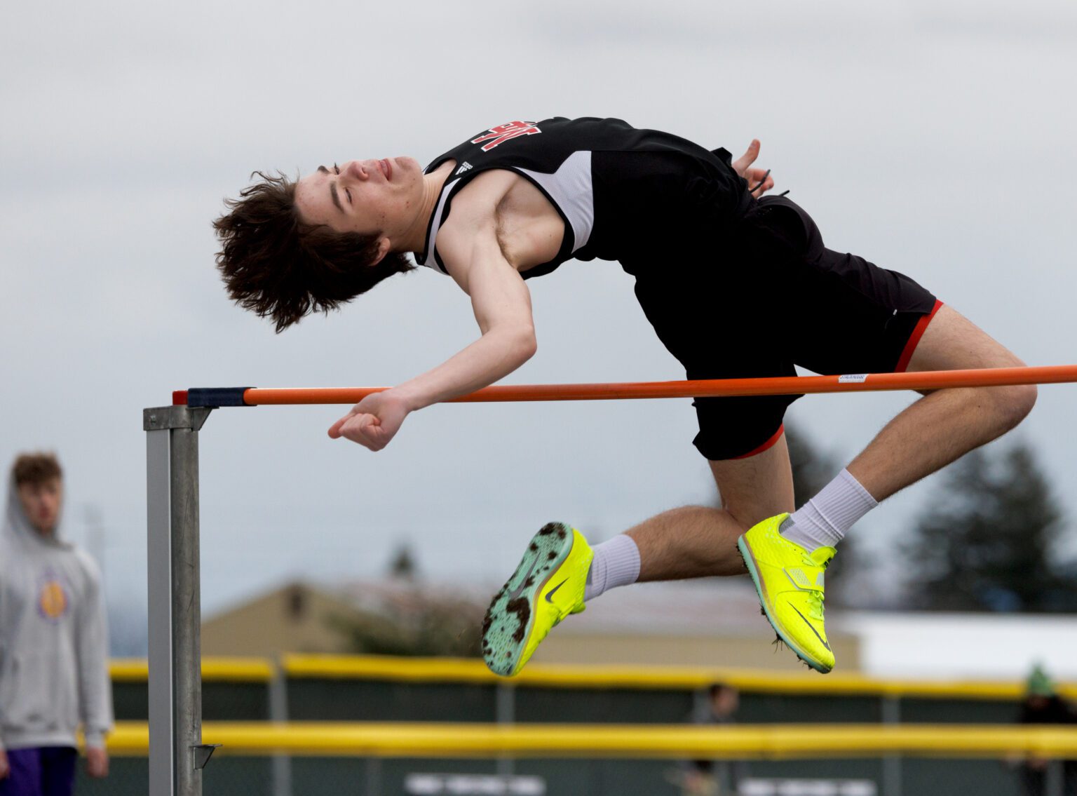 Mount Baker's Cole Lukes attempts to clear the bar with his back to it.