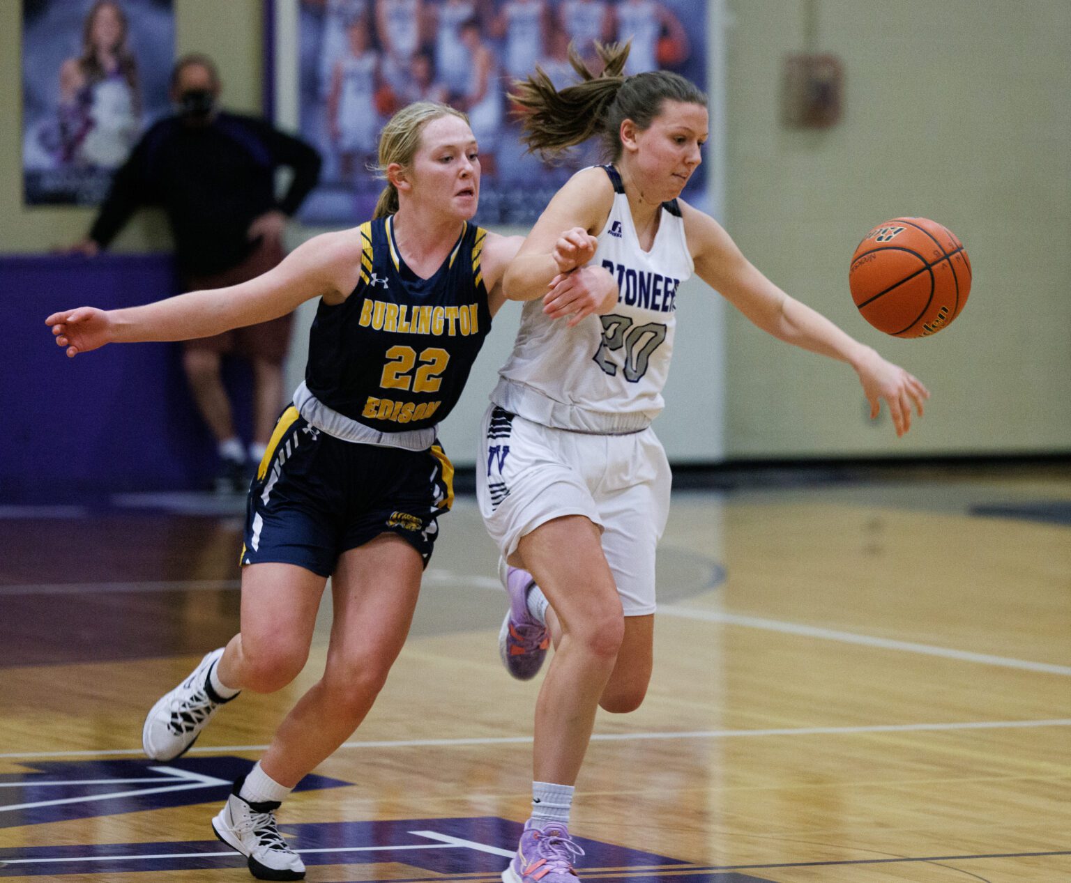 Burlington-Edison's Analise Slotemaker knocks the ball from the hands of Nooksack Valley’s McKenna Wichers.