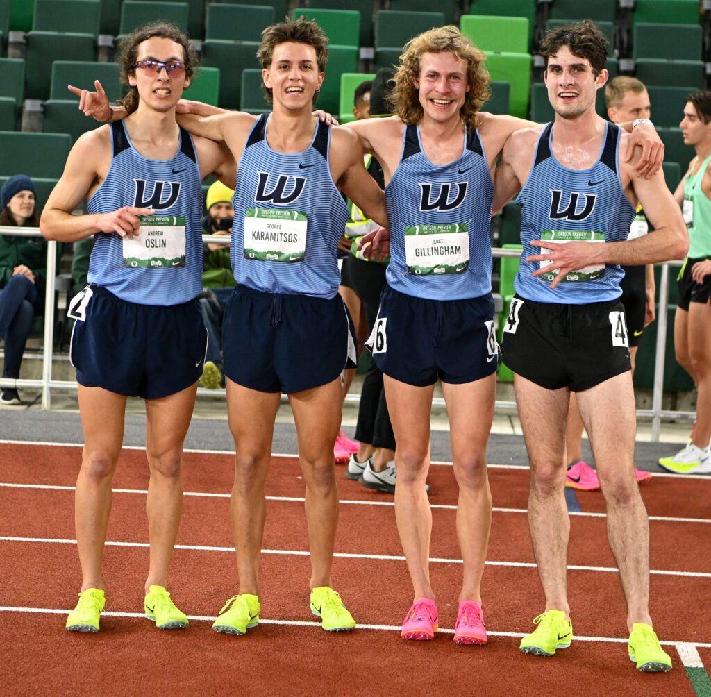 From left, Western Washington University sophomore distance runners Andrew Oslin, George Karamitsos, Jeret Gillingham and Kevin McDermott pose for a group photo with their arms around each other.