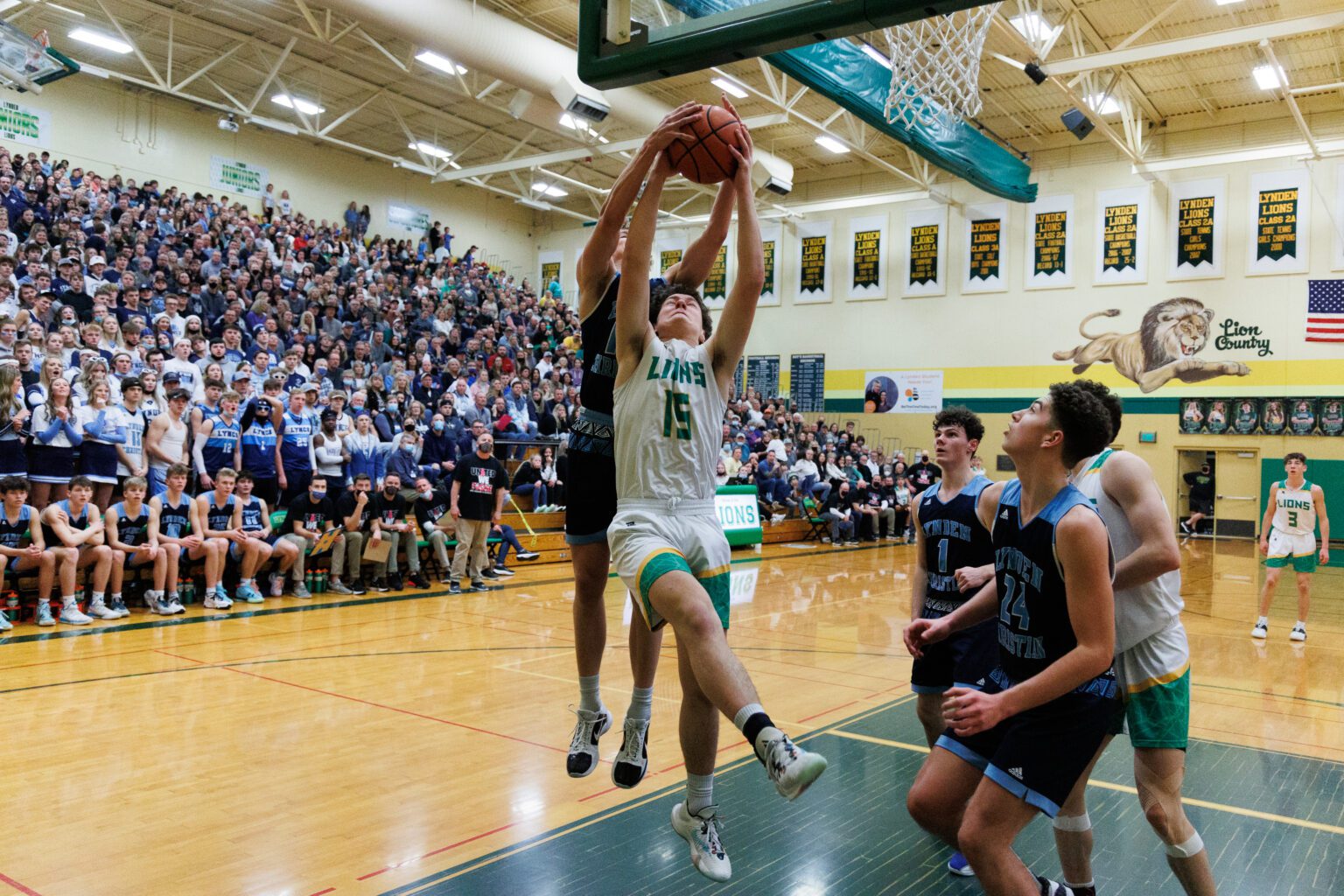 Lynden’s Trey Smiley puts up the ball surrounded by defenders.