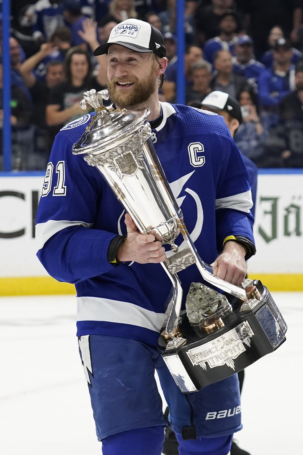 Tampa Bay Lightning center Steven Stamkos holds the Prince of Wales Trophy after defeating the New York Rangers during Game 6 of the NHL hockey Stanley Cup playoffs Eastern Conference finals June 11 in Tampa