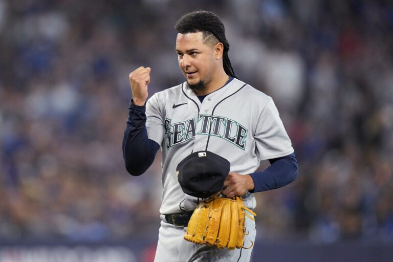 Seattle Mariners starting pitcher Luis Castillo raises his clenched fist.