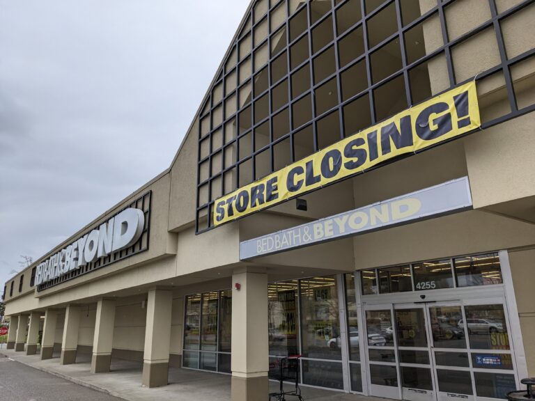 Bed Bath & Beyond's front entrance has a large sign notifying of their closure.
