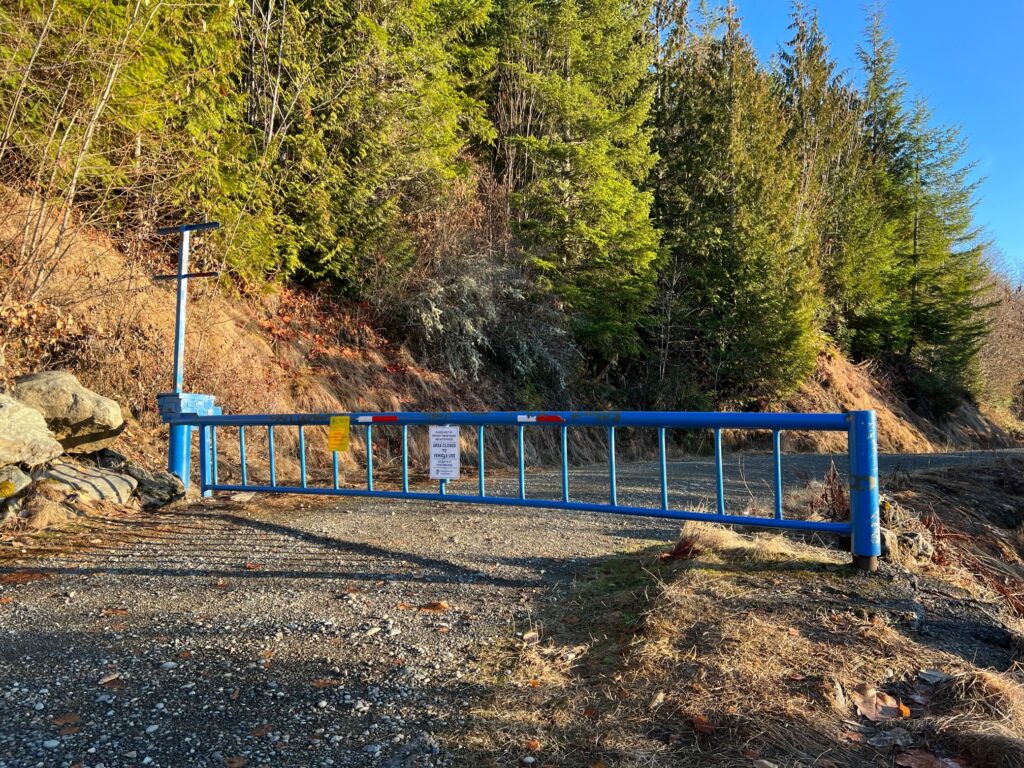 A blue fence keeps visitors gated off from the property.