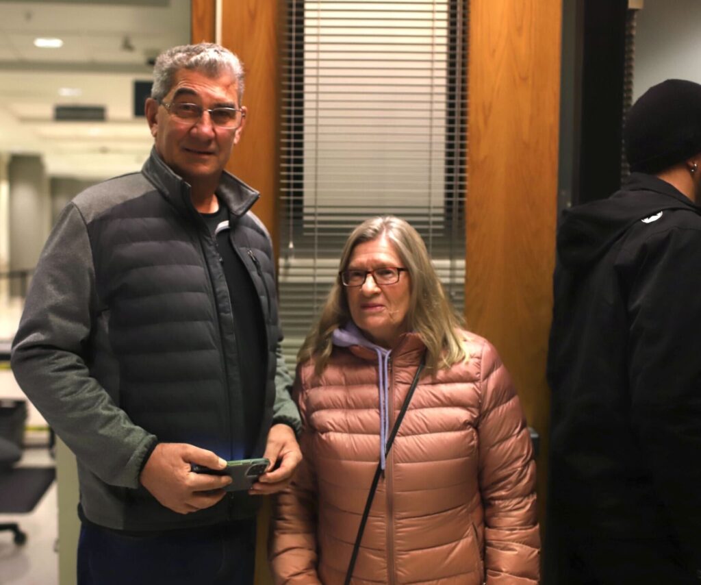 Ralph and Shirley Turner wait for their turn in the doorway at the courthouse.