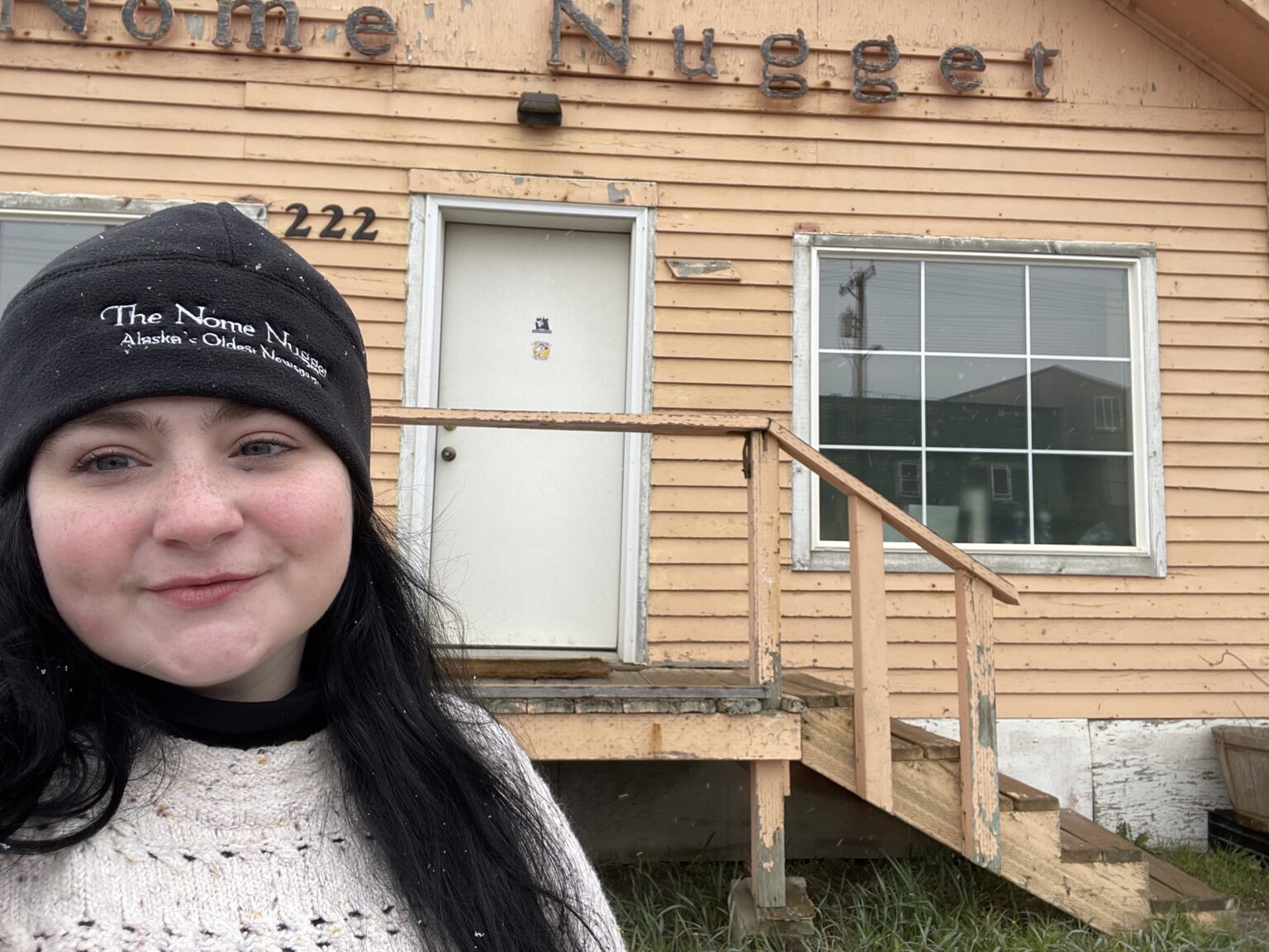 Julia Lerner in front of the Nome Nugget building.