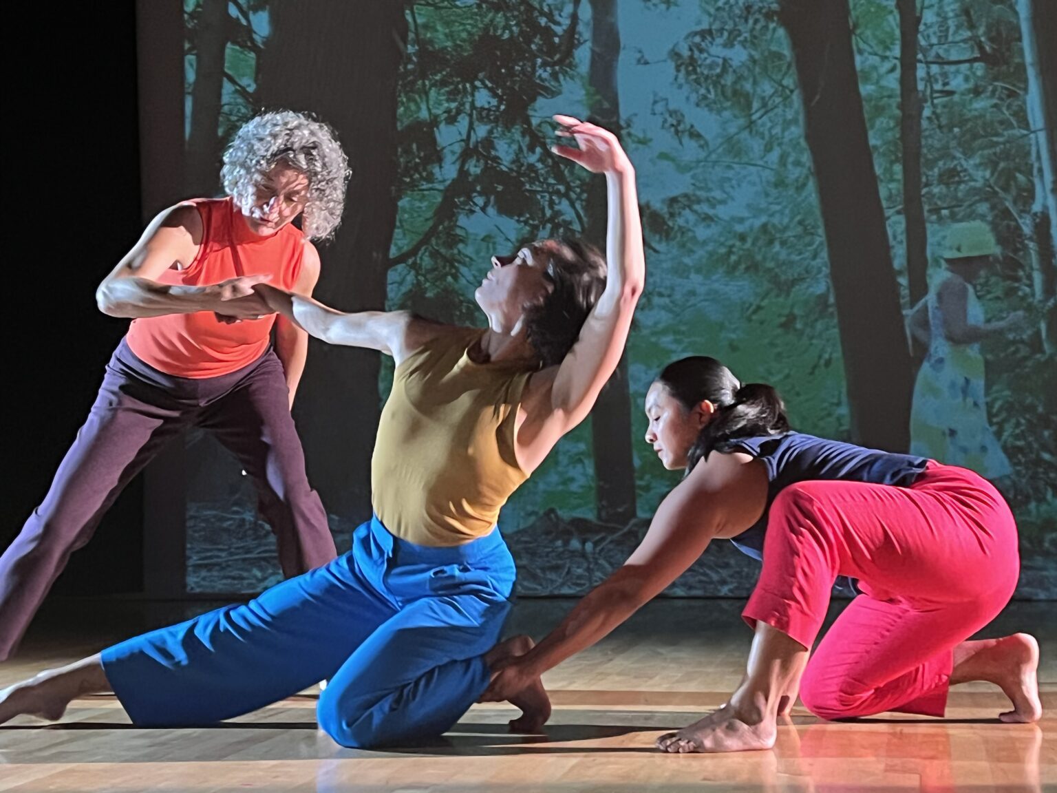 Pam Kuntz, left, Alona Christman and Angela Sebastian rehearse for upcoming performances of "Lean In" with their respective costumes.