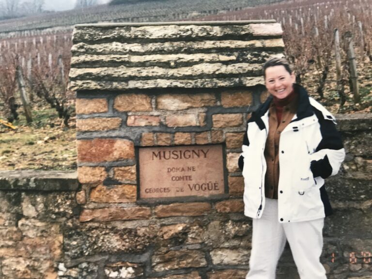 Katie Bechkowiak stands outside of Musigny, a world-famous vineyard, in Burgundy.