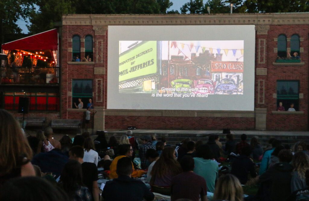 A large projector is put up for the movie.