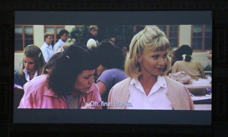 In a scene from the movie "Grease," Olivia Newton-John playing Sandy.