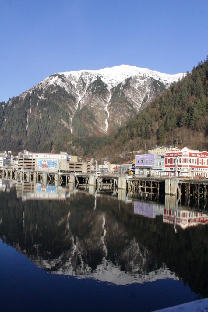 Downtown Juneau with the mountains looming behind them.