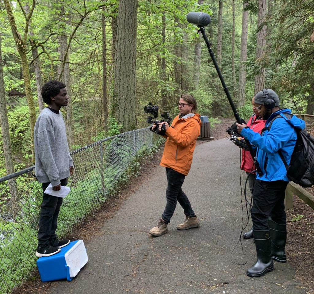 Isaac Gammons-Reese, Otto Arsenault, Kristina Michele Martens and Remy Styrk work on the Juneteenth Video Project as they get ready to record.