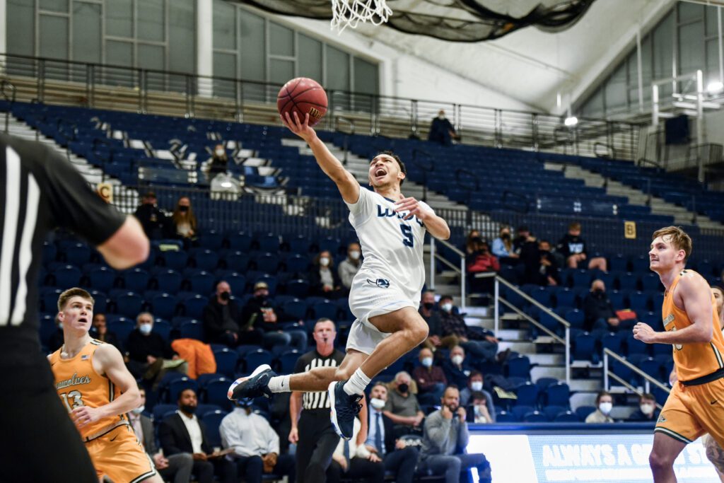 Western's D'Angelo Minnis leaps to make a shot.