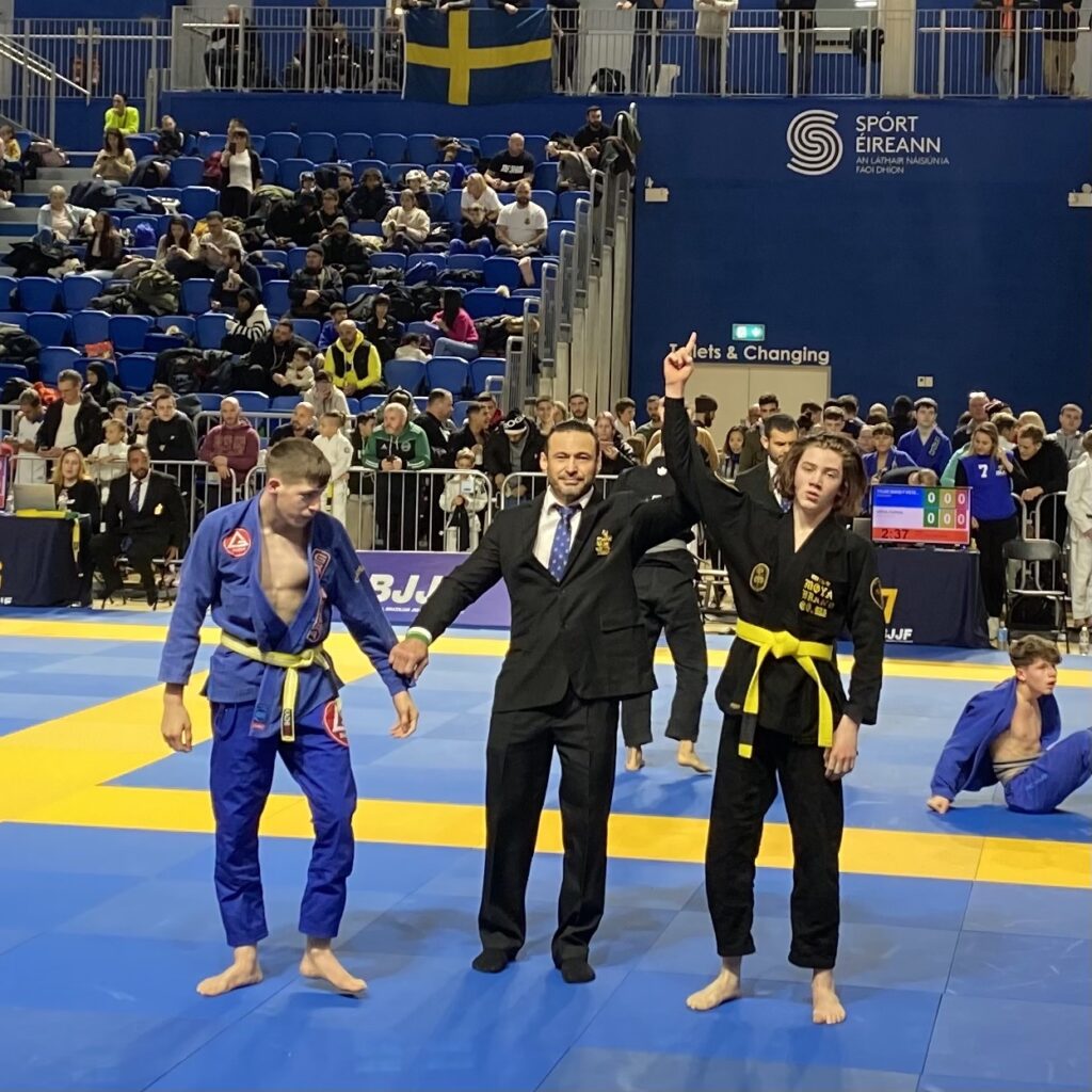 Marcel Senger, right, is announced as the winner with his arm being raised instead of his competitor.