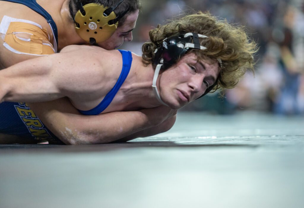 Ferndale's Sam Brulotte tries to keep his head off the mat.