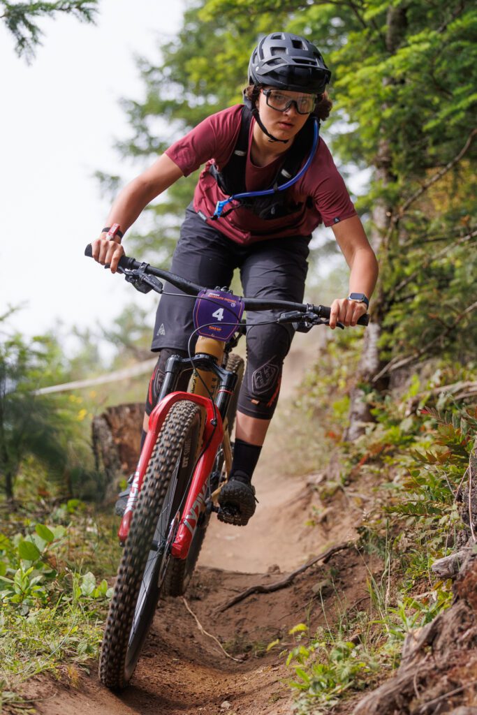 Matilda Melton, 14, leaves a trail of dust behind as they navigate their way through the narrow path.