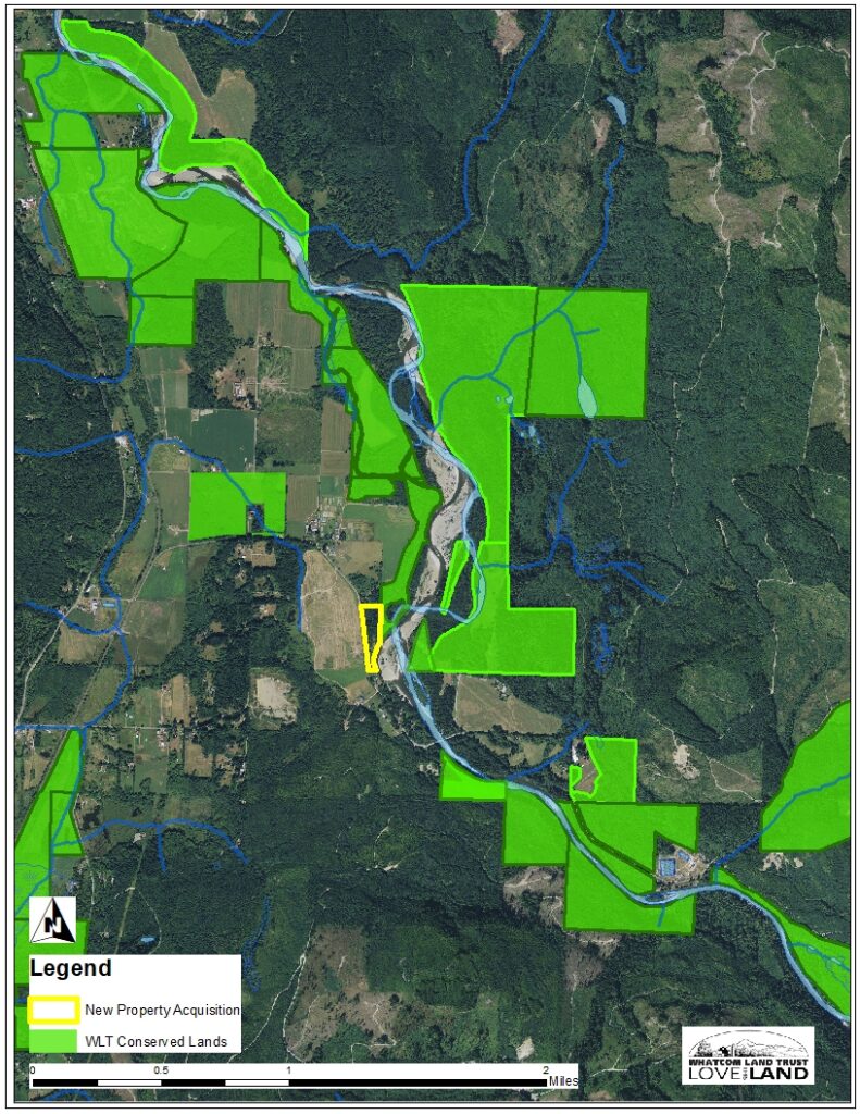 Green outlined areas show conserved lands compared to the yellow outline for the newly acquitted property.