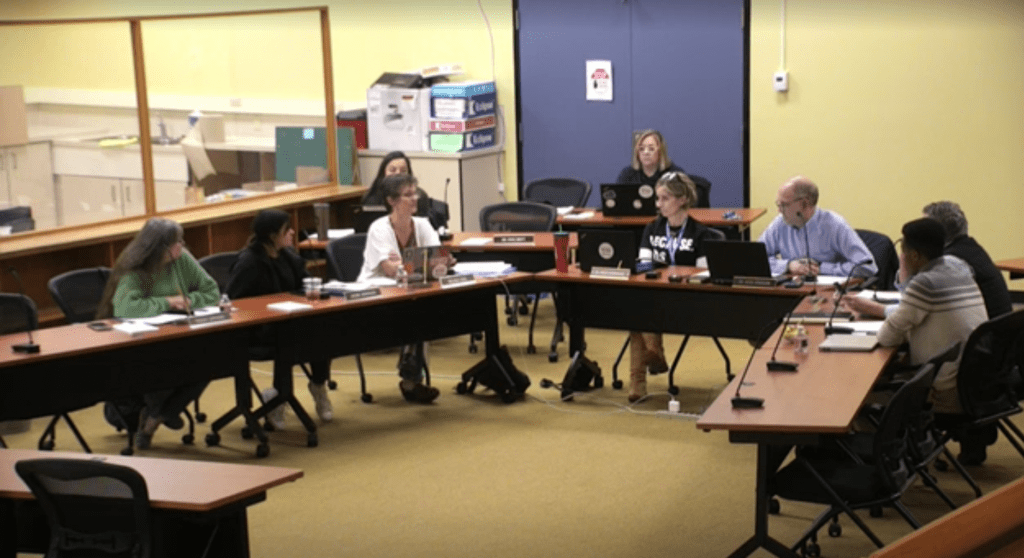 The Ferndale School District Board of Directors meets to discuss applicants.