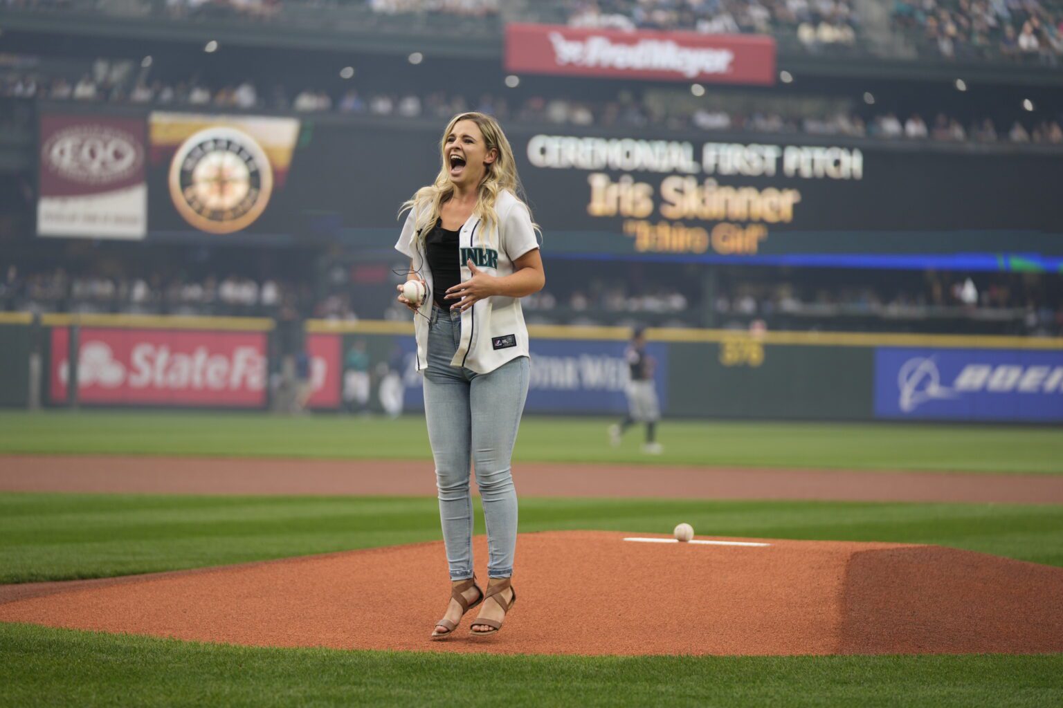 Bellingham resident Iris Skinner prepares to throw out the first pitch.