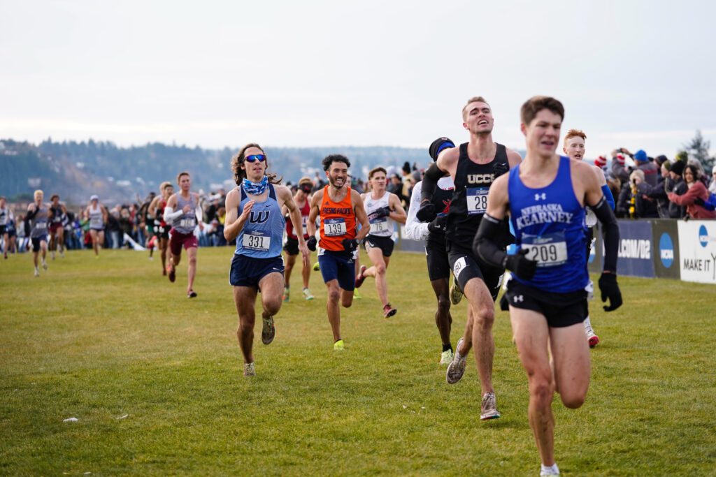 Western Washington University men's cross country runner Andrew Oslin trails behind the leading runners.