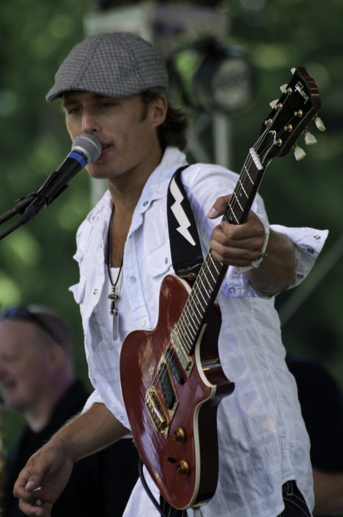 Powerhouse musician Chris Eger with his guitar.