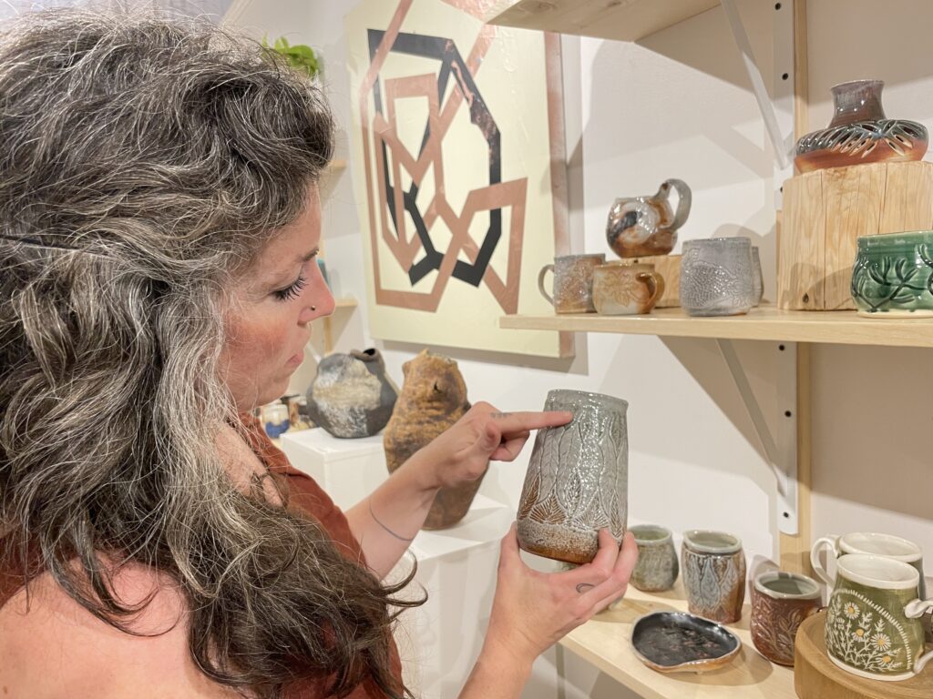 Erica Davidson of Circa Pottery showed off one of the pieces she fired using the soda kiln at Burnish Clay Studio on June 10. The vessel made by throwing baking soda into the kiln as its firing makes the works appear as if they’d been covered in fairy dust.