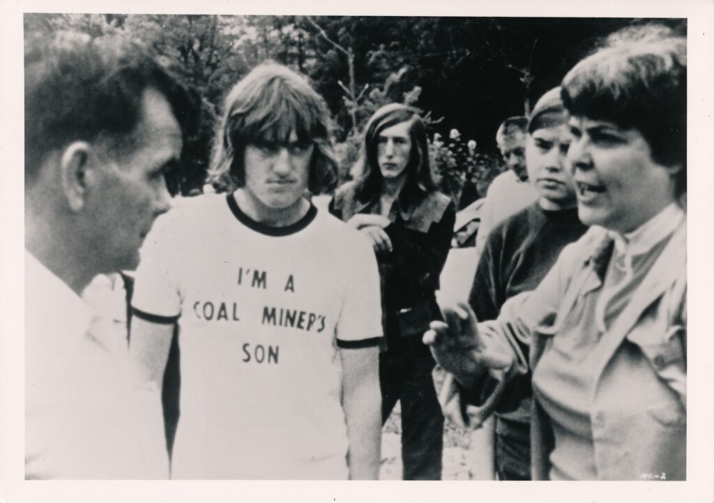 A scene from Barbara Kopple's 1977 documentary about a Kentucky coal miners' strike shows a group discussing as one young man wears a shirt saying "I'm a Coal Miner's Son."