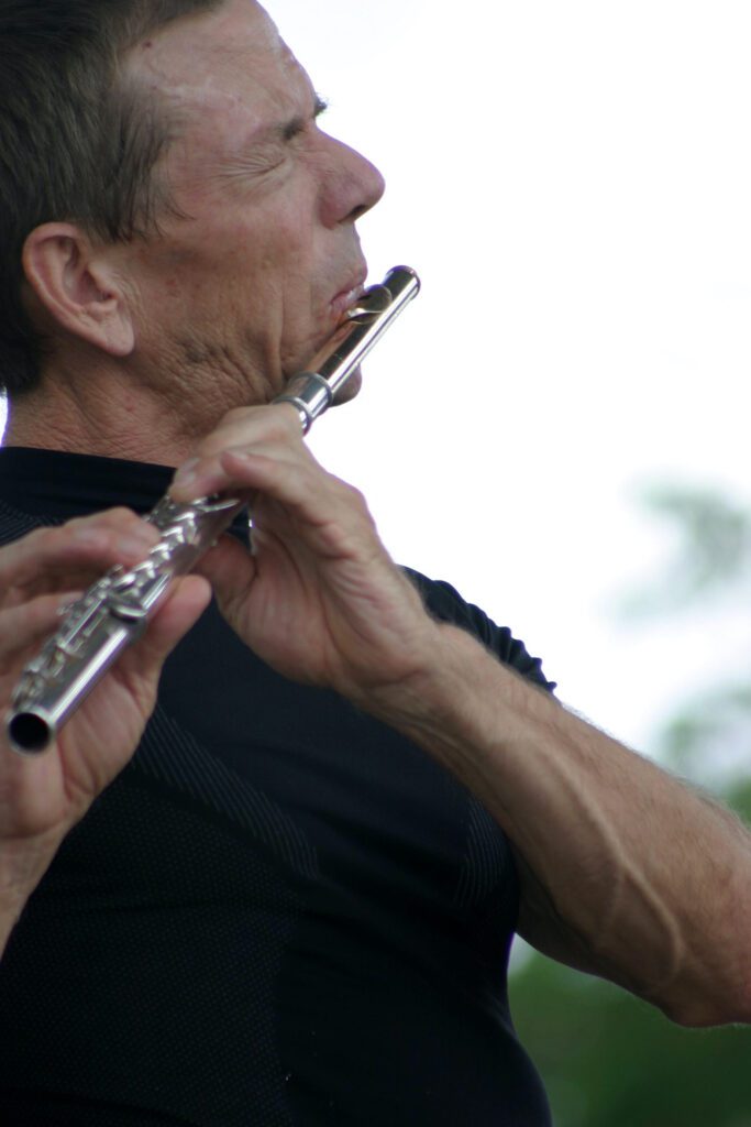 Matt Eakle plays the flute passionately.