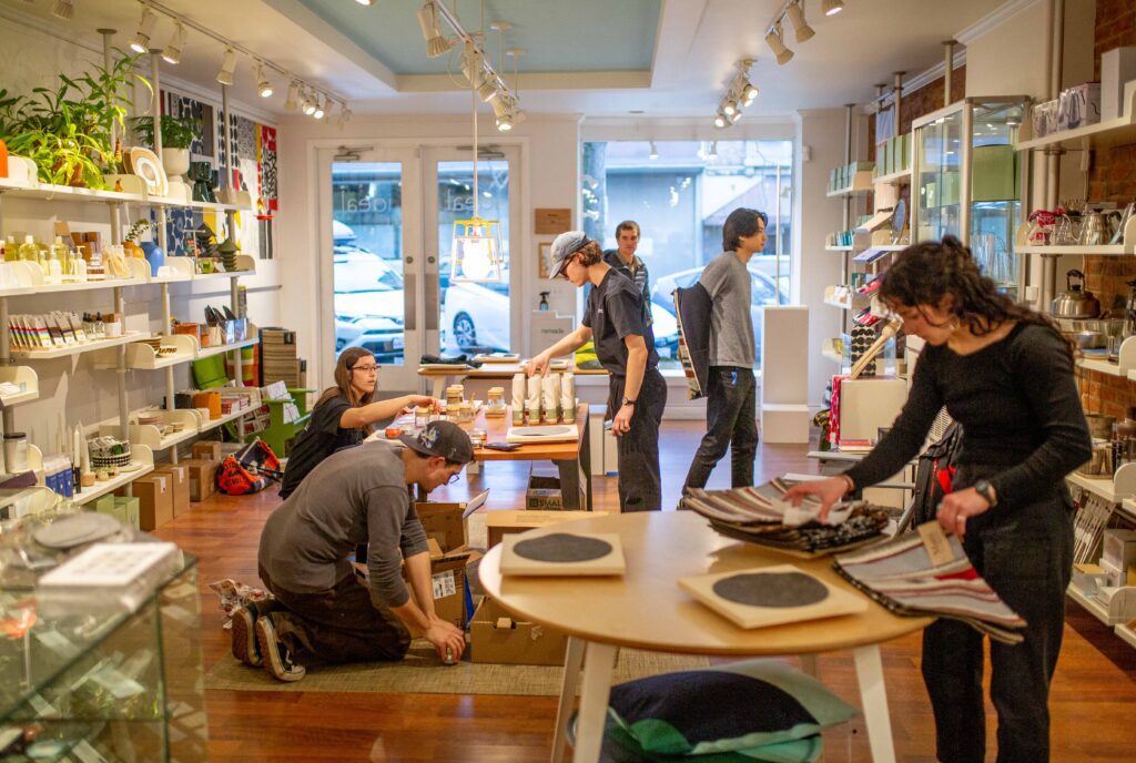 Western Washington University students prepare their work to be displayed