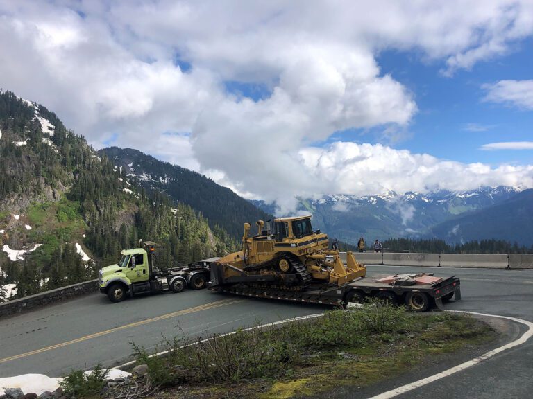 The road to Artist Point blocked by the truck and its trailer.