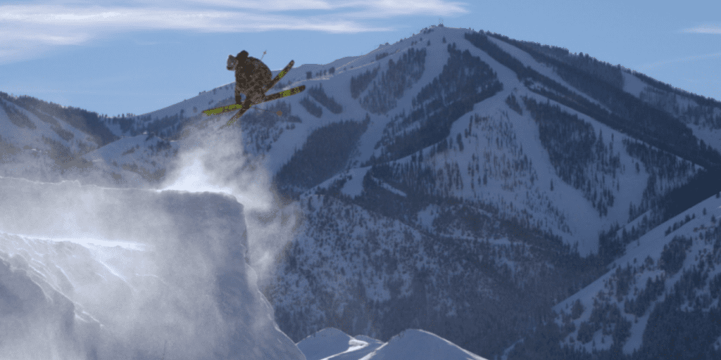 A scene from "Daymaker" shows a skier flying to a dune.